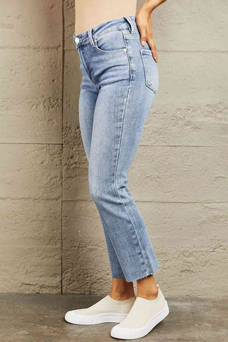 Mid Rise Cropped Raw Hem Slim Jeans